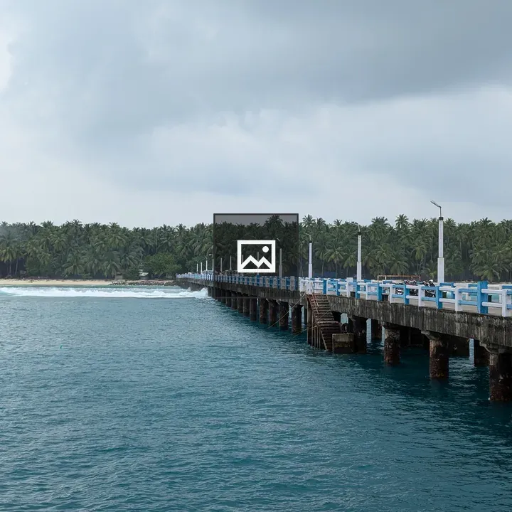 Pier Along Calm Blue Waters