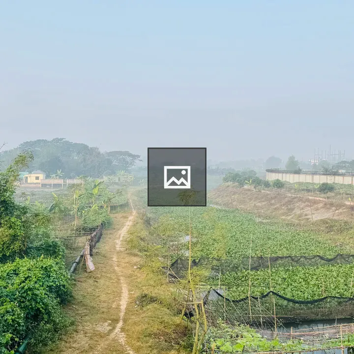 Narrow Path Through Rural Landscape