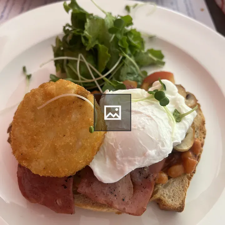 Breakfast plate with toast and hash browns