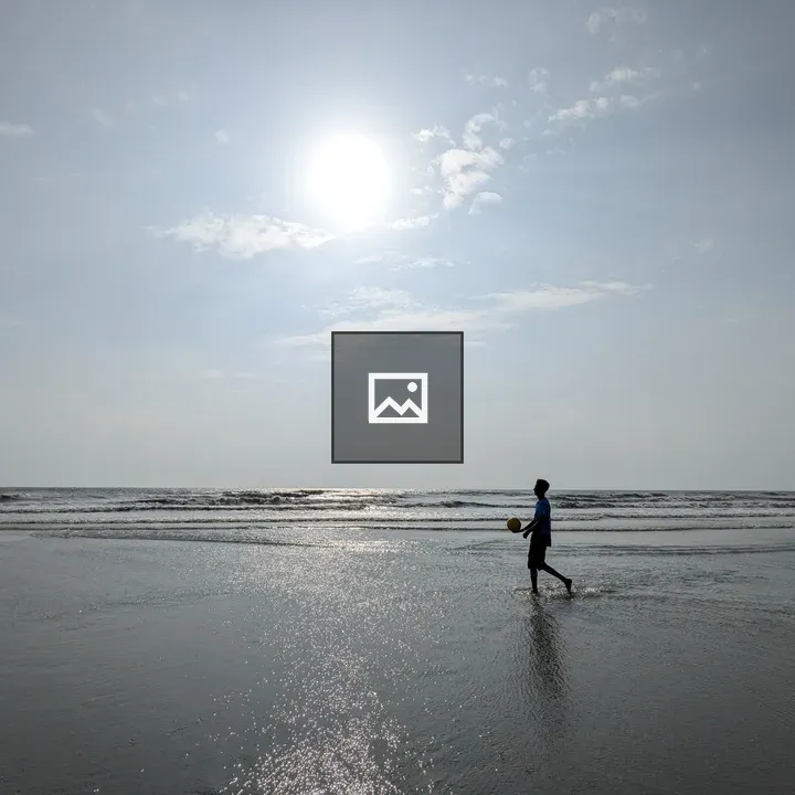 Boy with a ball at Lal Kakra Beach