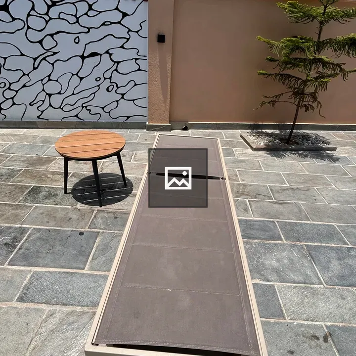 Patio with Stone Floor and Lounge Chair