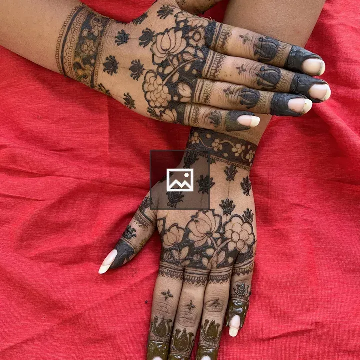 Henna designs on red fabric