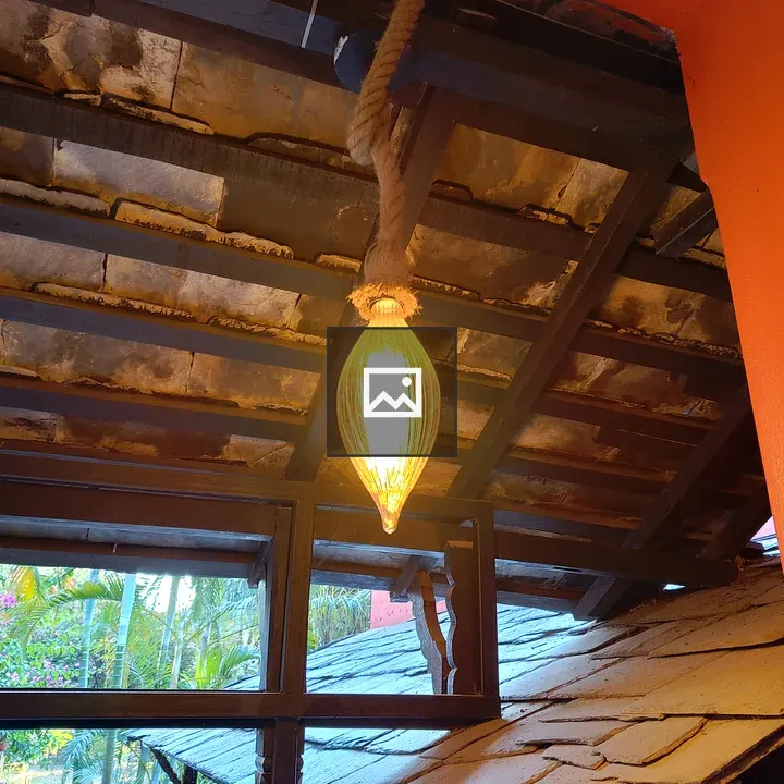 Pendant light under wooden beams