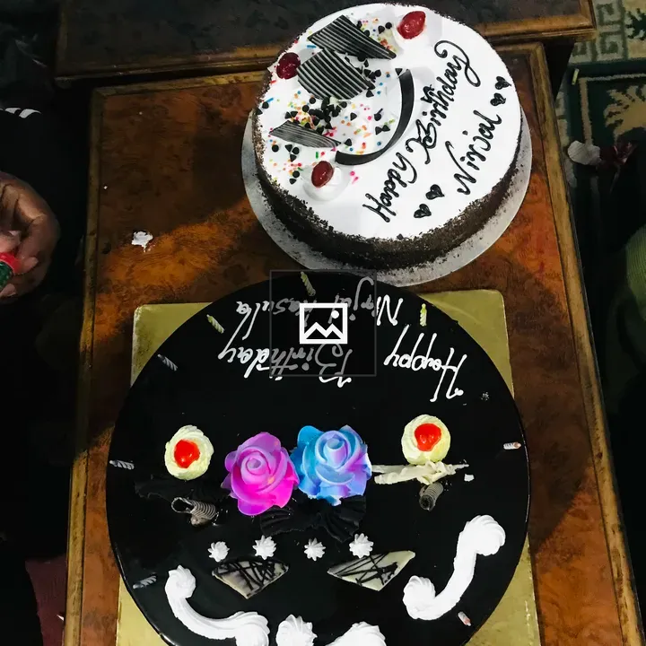 Two Black and White Birthday Cakes