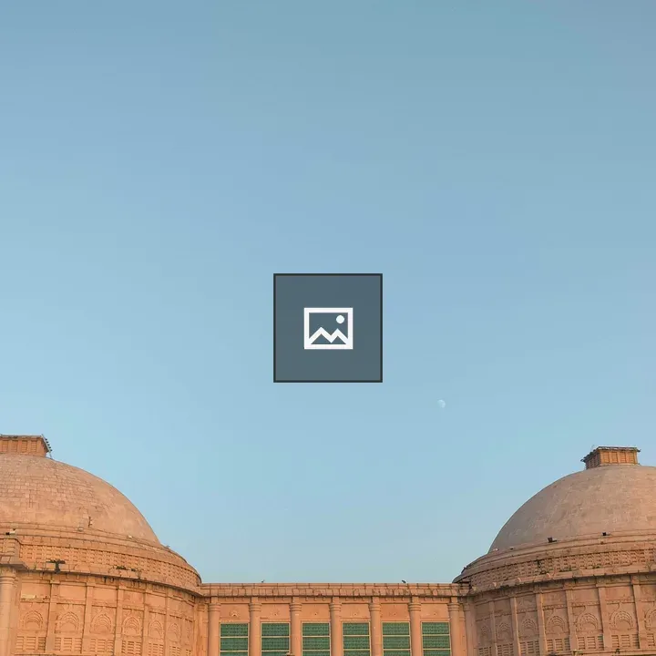 Two domed roofs and blue sky