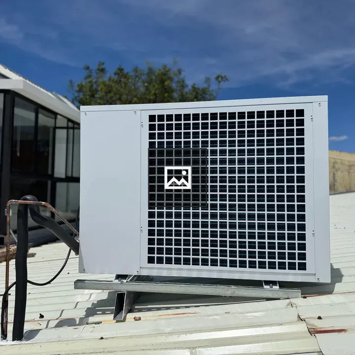 Air conditioning unit on sloped roof