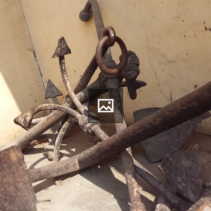 Ancient rusty boat anchors
