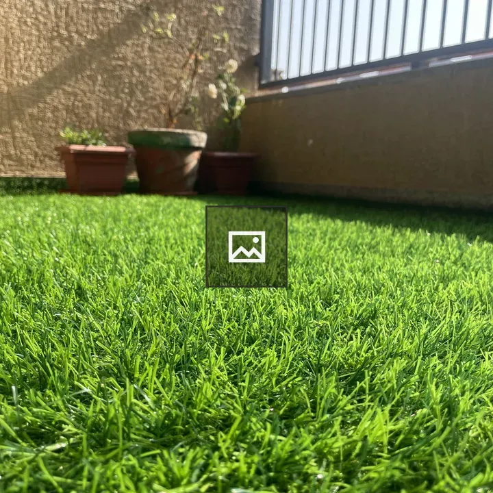 Grass floor by a wall