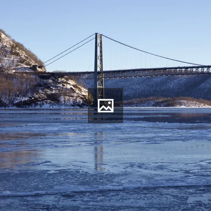 Bear Mountain Bridge over icy Hudson River