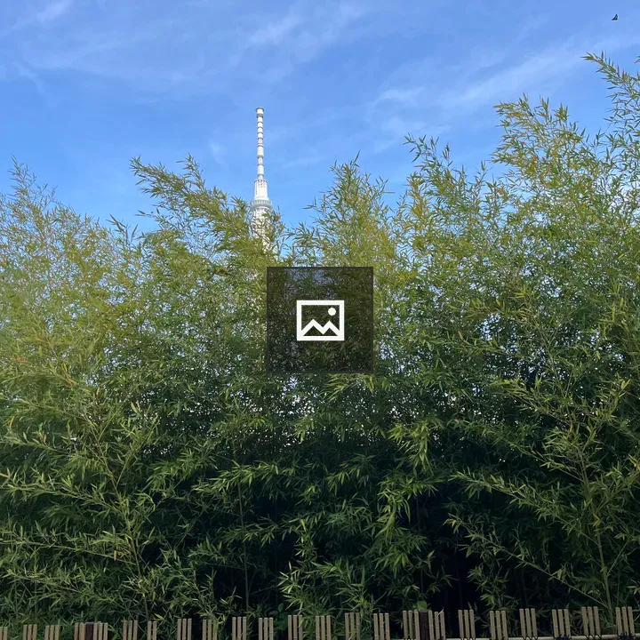 Clock tower with bamboo backdrop