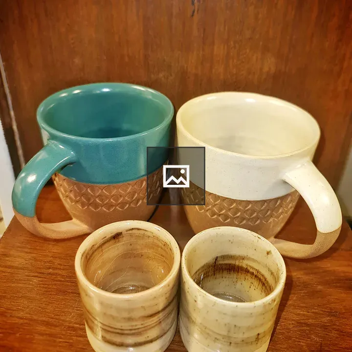 Two sets of teacups