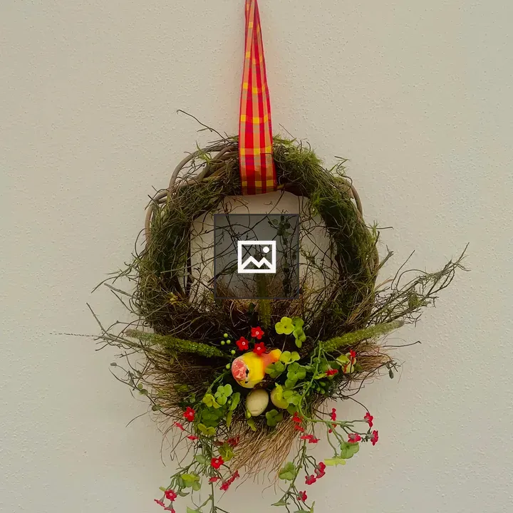 Wall decoration with flowers and grass