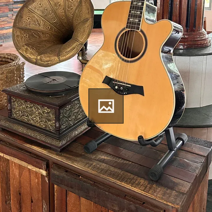 Guitar and Gramophone on Table