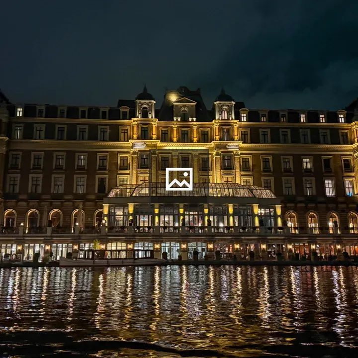 Riverside grand building at night