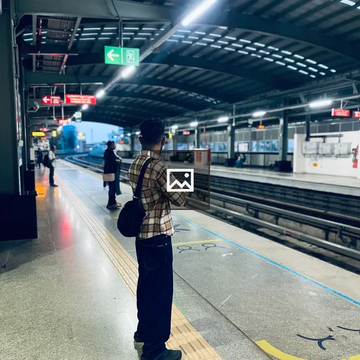 Young man on metro platform