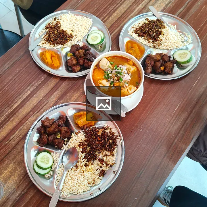 Three Silver Plates with Food