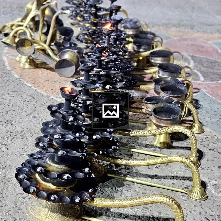 Rows of Handcrafted Oil Lamps