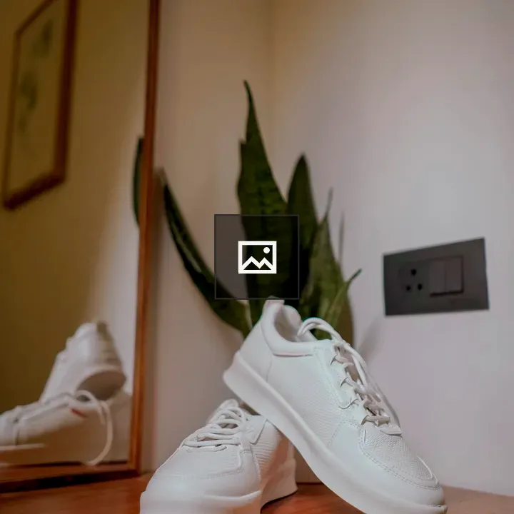 White shoe on a wooden table