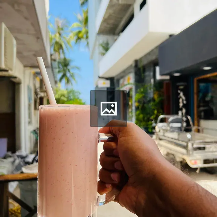 Man holding smoothie
