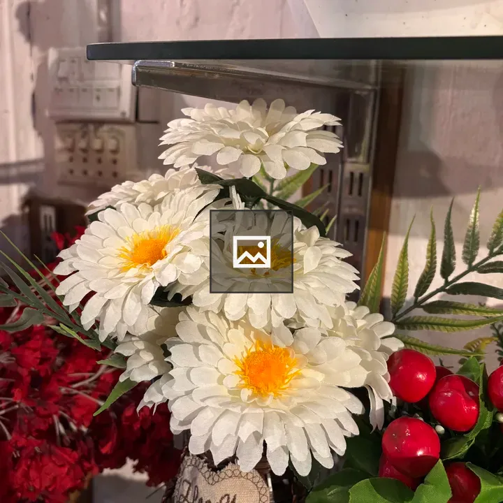 Daisies in a woven vase