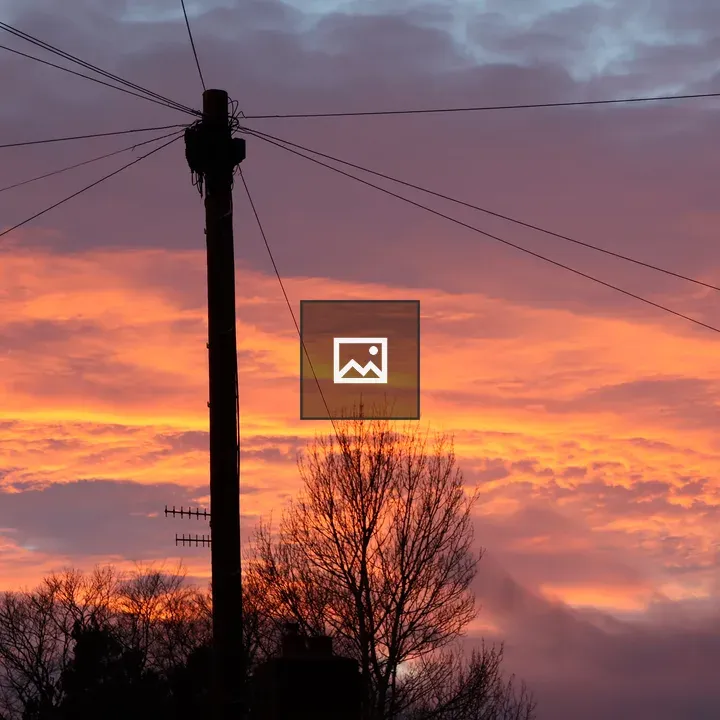 Sunset Lamppost Over Wires