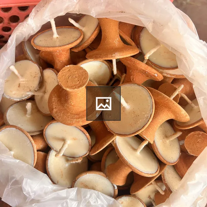 Plastic bag candles in brown and white
