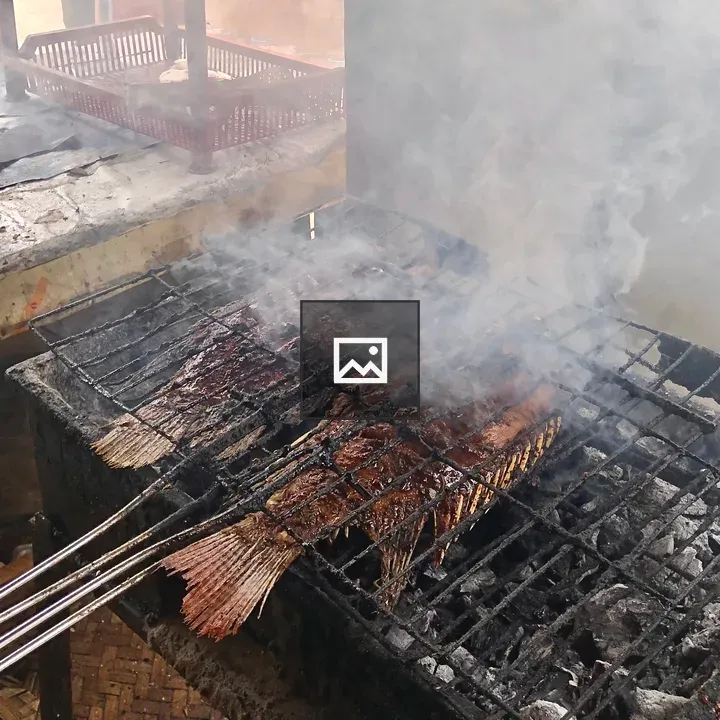 Grilling fish in traditional way