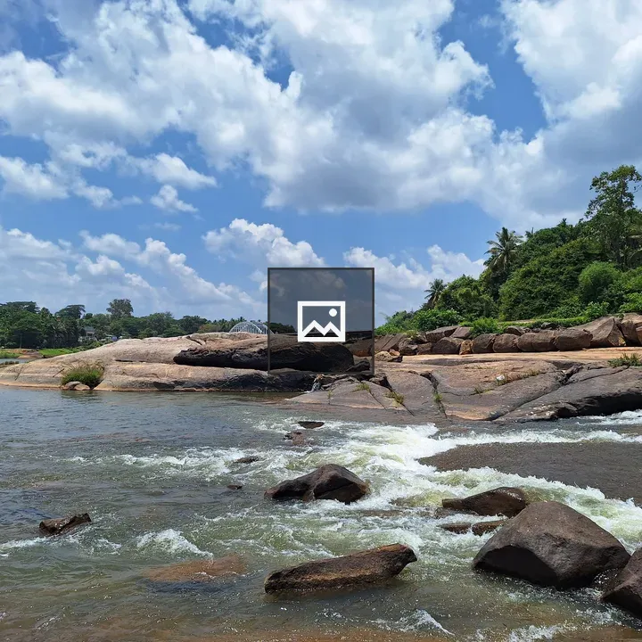 River over rocks with greenery
