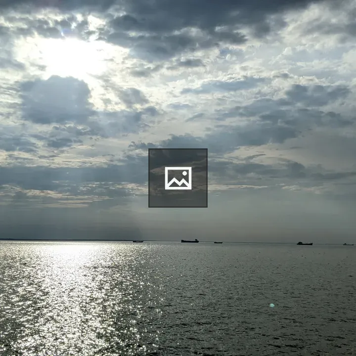 Seascape with Boats under Cloudy Sky