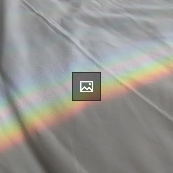 Rainbow on a bed blanket