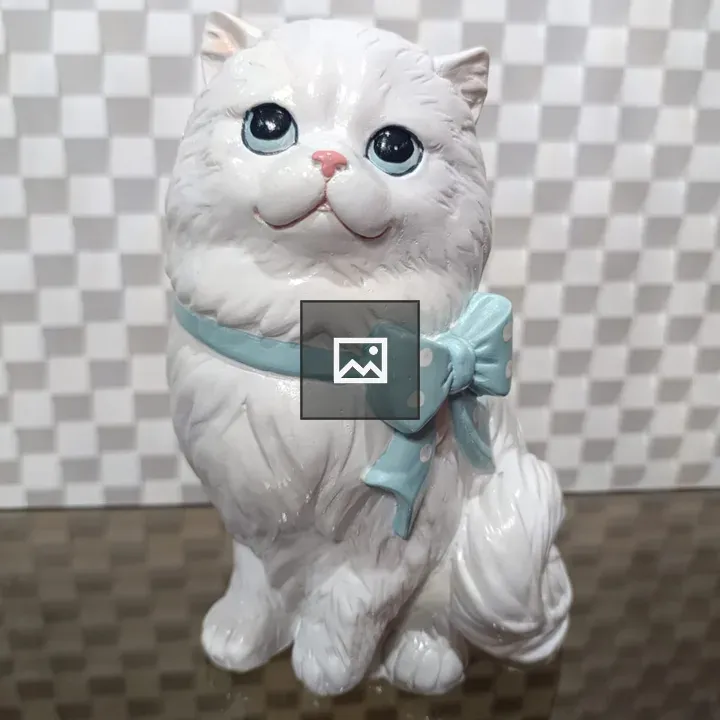 Ceramic fluffy cat figurine