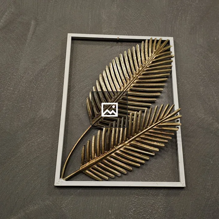 Wall art with golden palm leaves