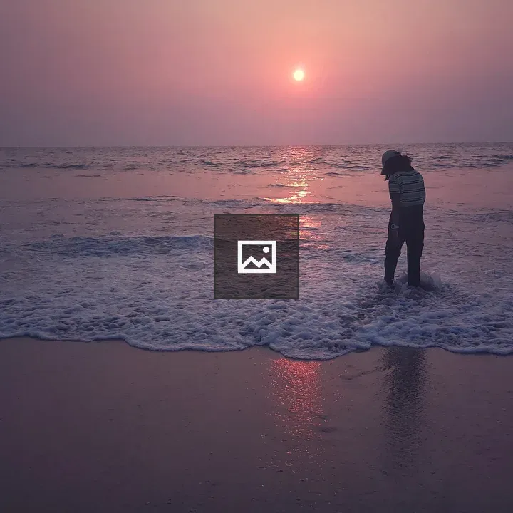 Person on Beach at Sunset