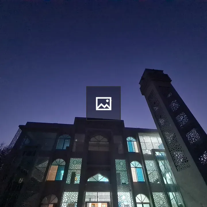 Crescent Moon Over Tower and Building