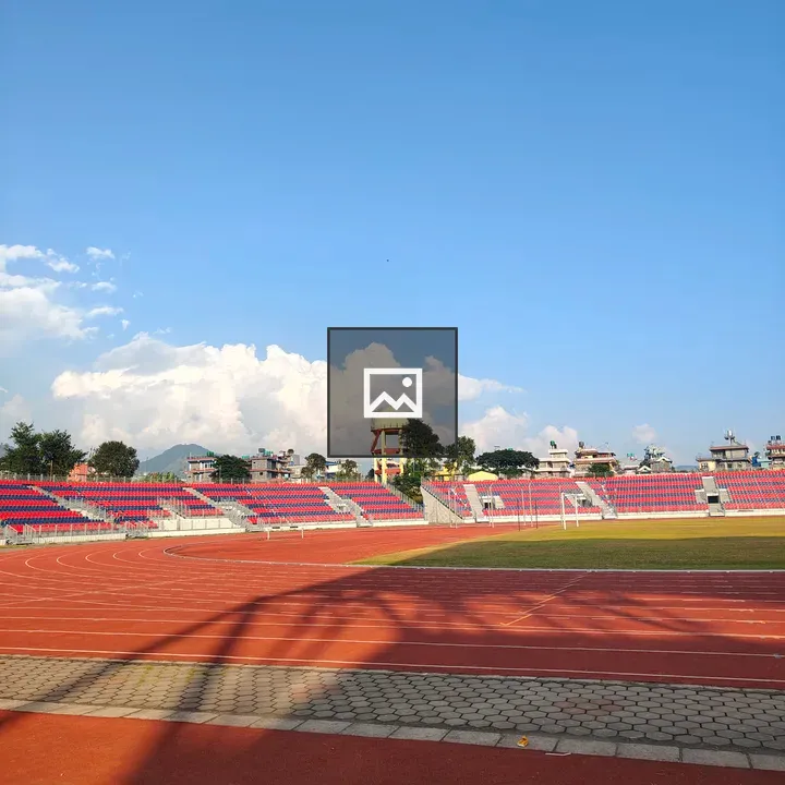 Stadium bleachers under blue sky