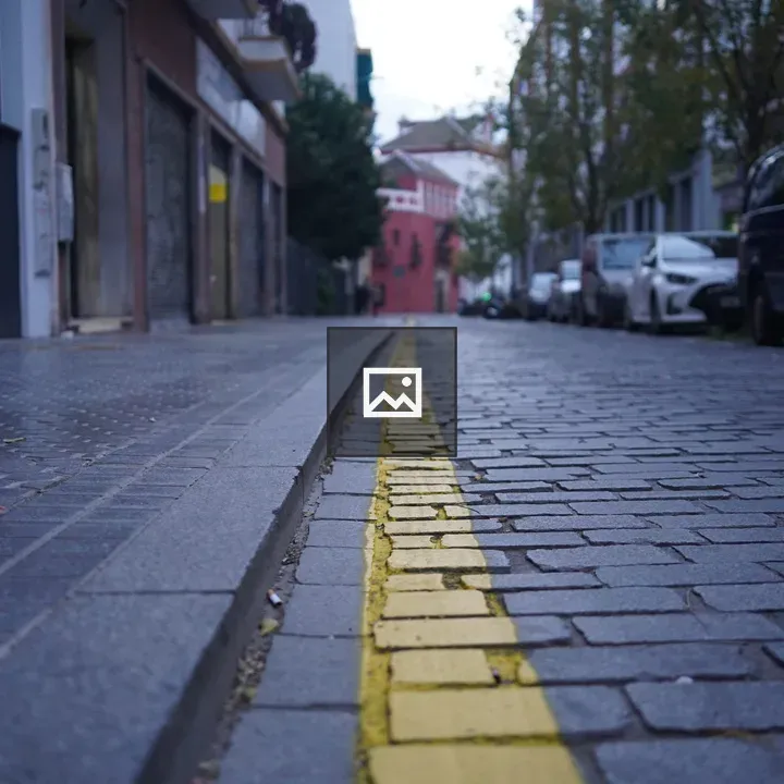 Quiet urban street with cobblestones