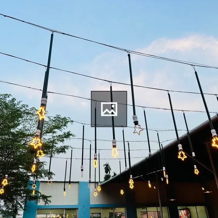 Hanging decorative lights in Nepal restaurant