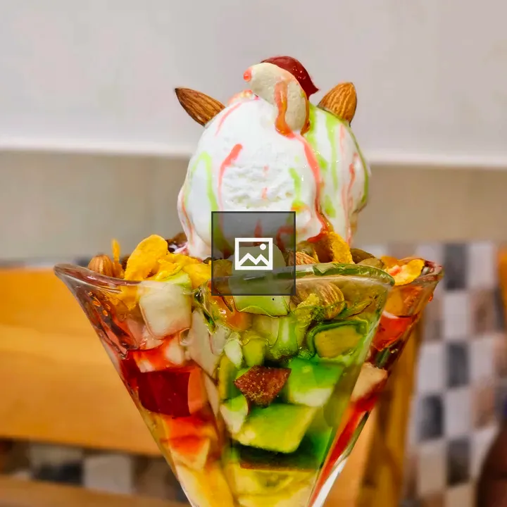 Fruit salad with ice cream