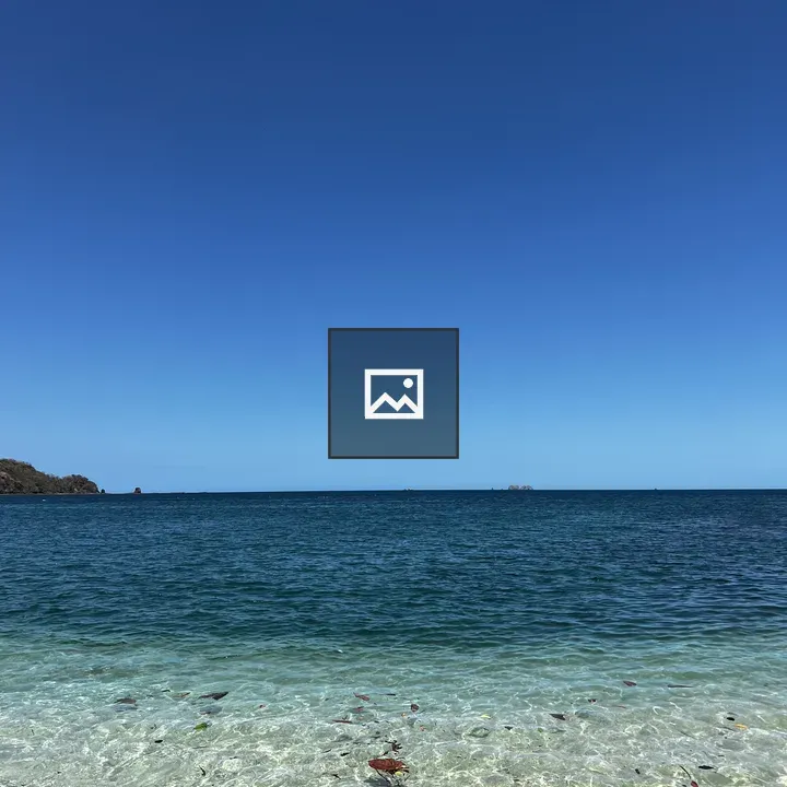 Serene Beach Scene with Shallow Blue Water