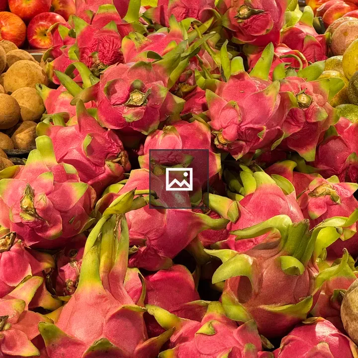 Pink Dragon Fruit and Apples at Market
