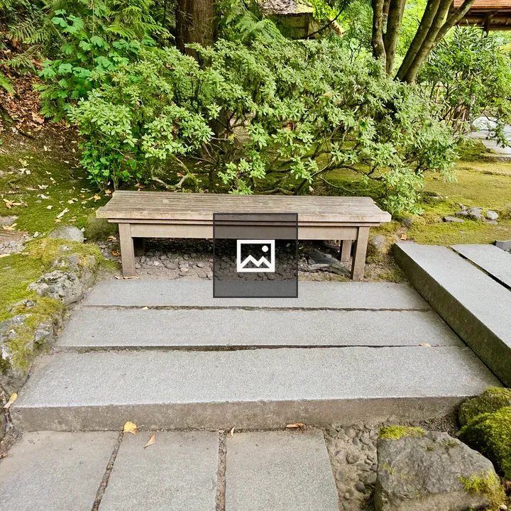 Wooden bench by stone steps