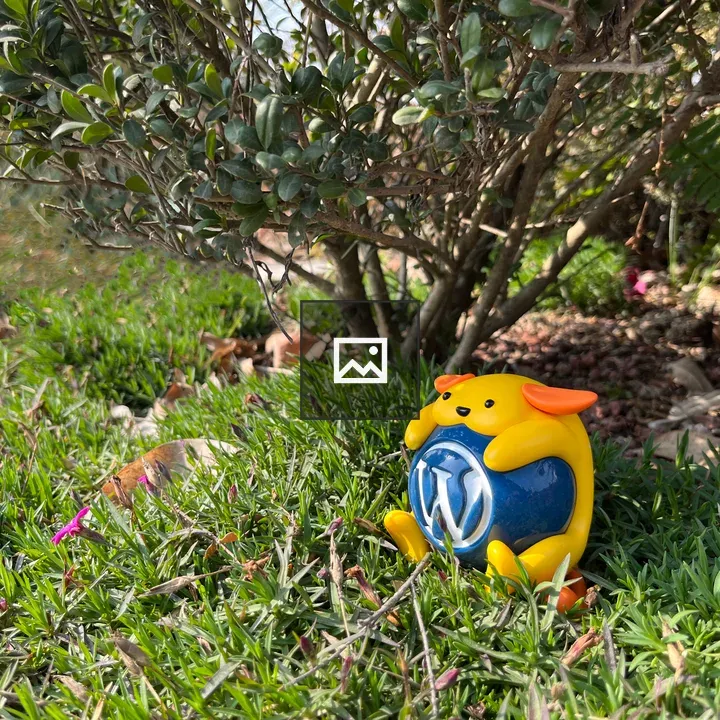 Wapuu Resting Under a Tree