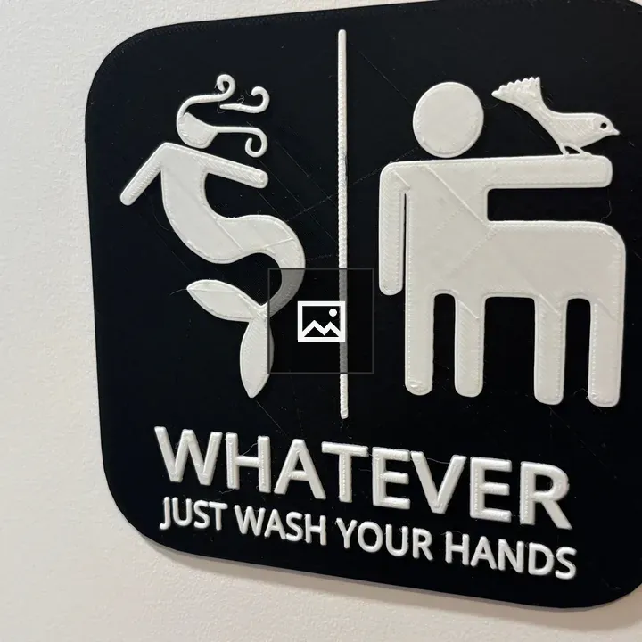 Bathroom sign with mythical figures