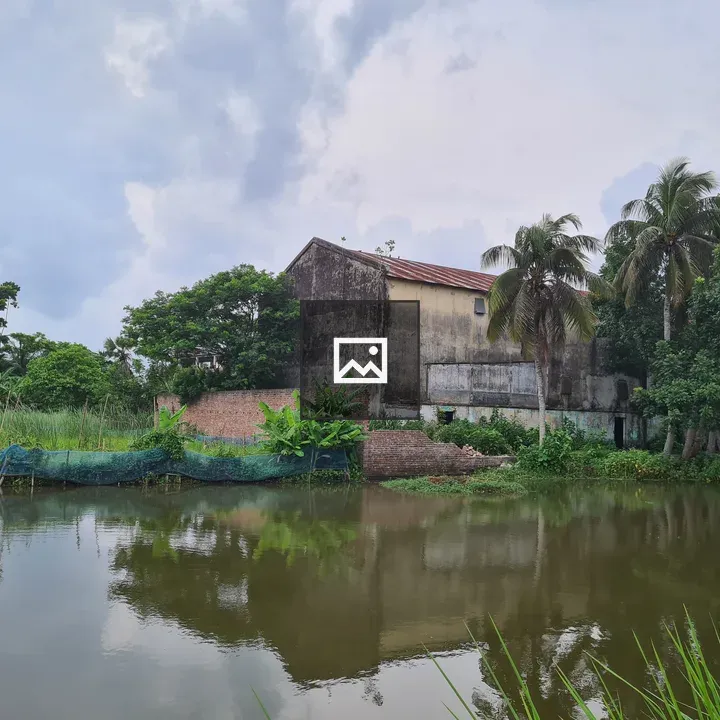 Abandoned Cinema Hall and Water Pond