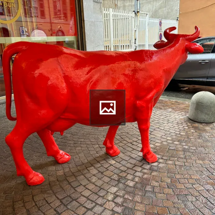 Red cow statue in Turin