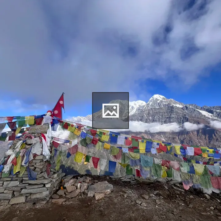 Prayer Flags Over Mountain Landscape