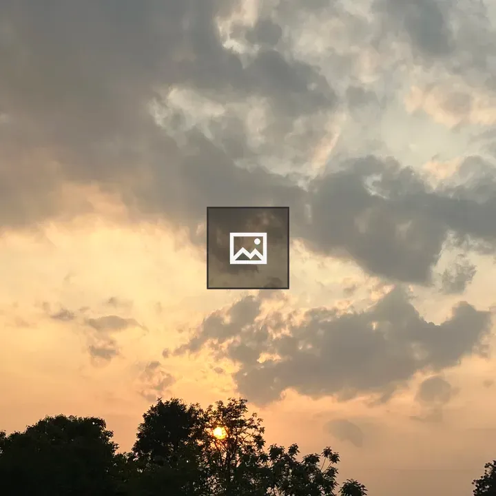 Sunset Clouds Behind Trees