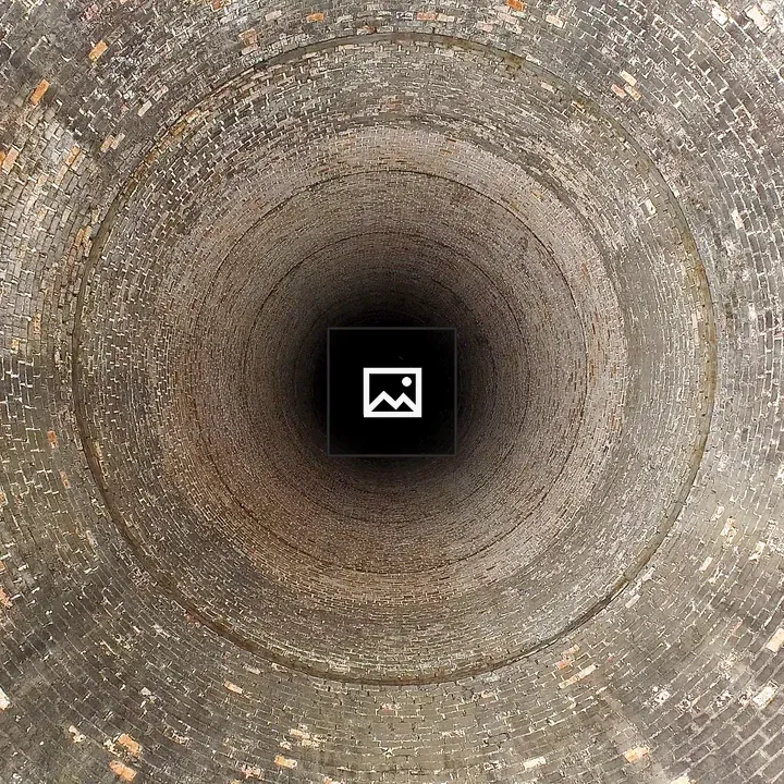 Disused power station chimney