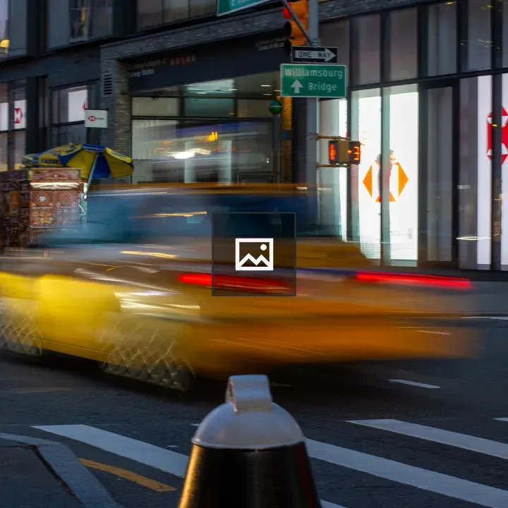 Yellow cab on busy NYC street