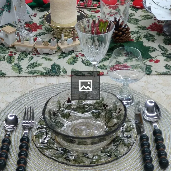Dining Table with Green Patterned Linens